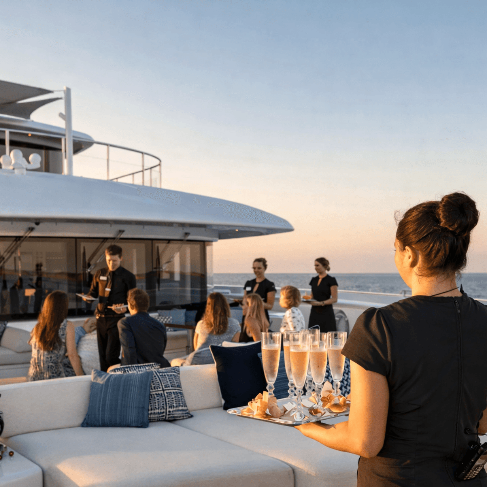 Champagne service on yacht at sunset