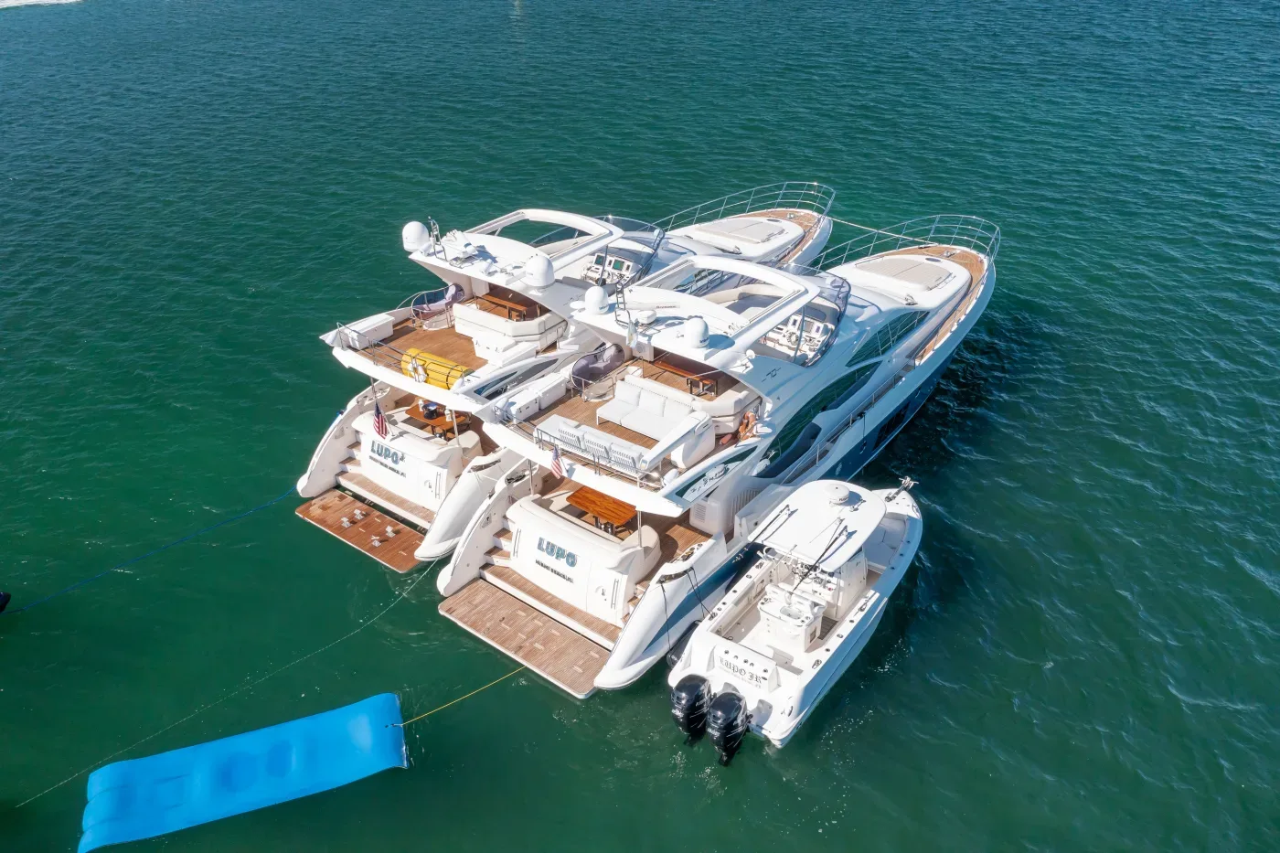 Twin yacht formation for 20 guest yacht rental fort lauderdale, two boats anchored side by side on the Intracoastal
